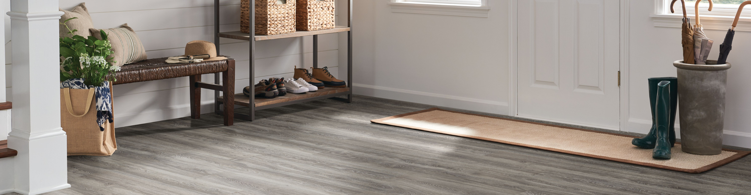 grey vinyl plank floor in entryway
