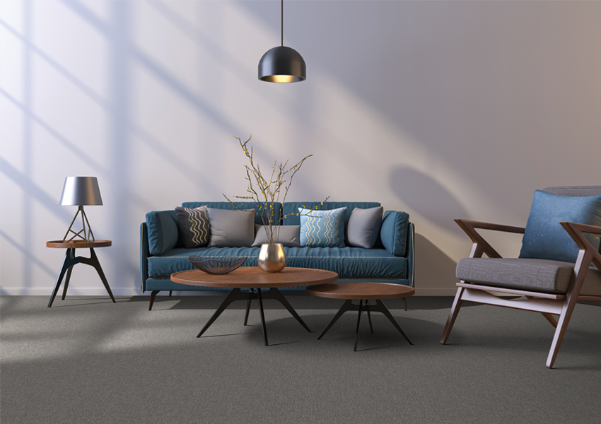 dark grey carpet in living room with midcentury modern furniture